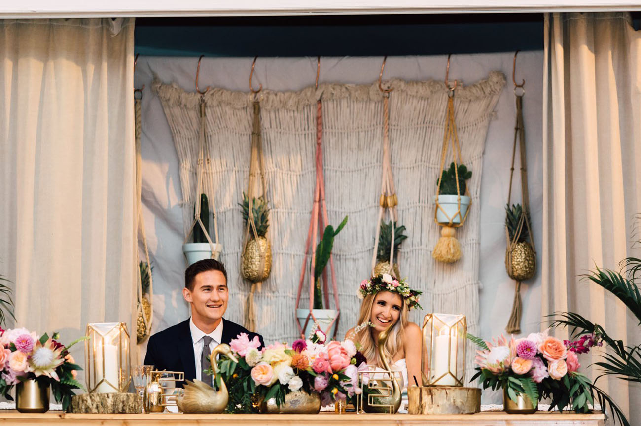The reception was boho-chic, with lots of flowers and gilded pots