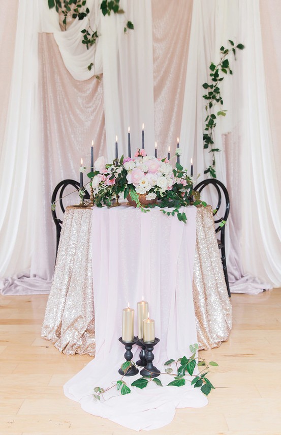 Sequin tablecloth with a blush runner looks very glam