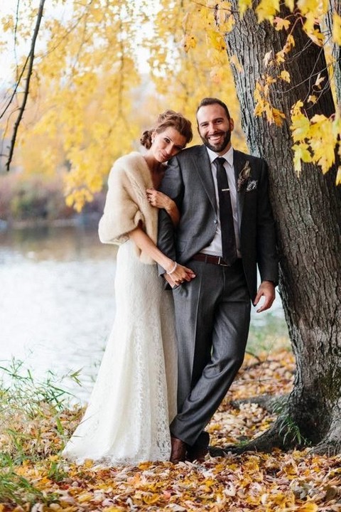 cream fur cover up for a cold fall wedding