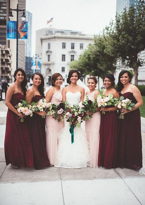 marsala maxi bridesmaids' gowns and blush one-shoulder ones for the bride's sisters