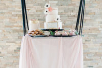 14 The dessert table was hung, it was also done in blush and black