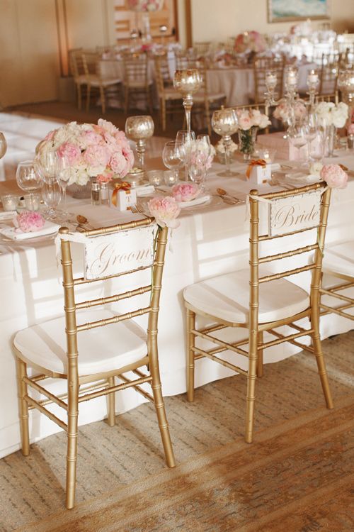 blush table decor and gold chairs