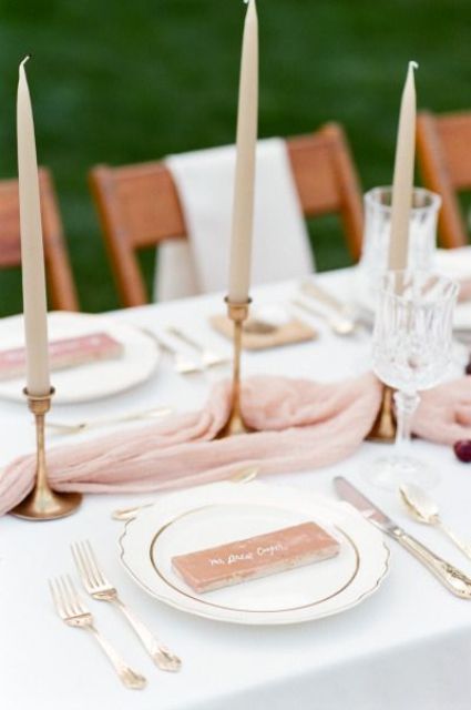 blush table runner and gold candle holders