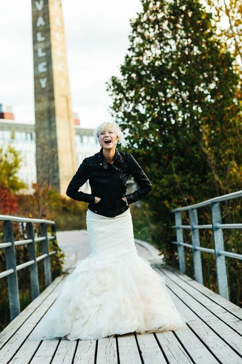 Vera Wang wedding gown with a short leather jacket