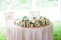 21 blush tablecloth and gold letters