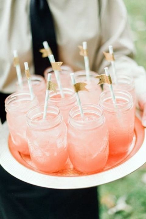 blush cocktails with gold stirrers