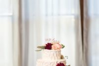 28 shades of burgundy, blush and champagne gave this cake a timeless elegance