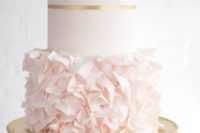 32 blush ruffled wedding cake with gold stripes
