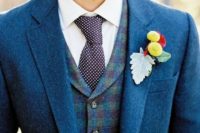 Blue jacket with plaid waistcoat and polka dot tie