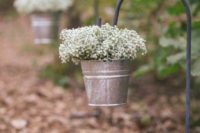 Buckets with baby breath flowers