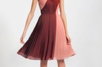 Cool peach and red knee-length pleated dress