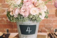 Table number with light pink roses and chalkboard