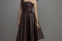 a classic strapless midi brown bridesmaid dress with bow and embellished shoes for a vintage wedding