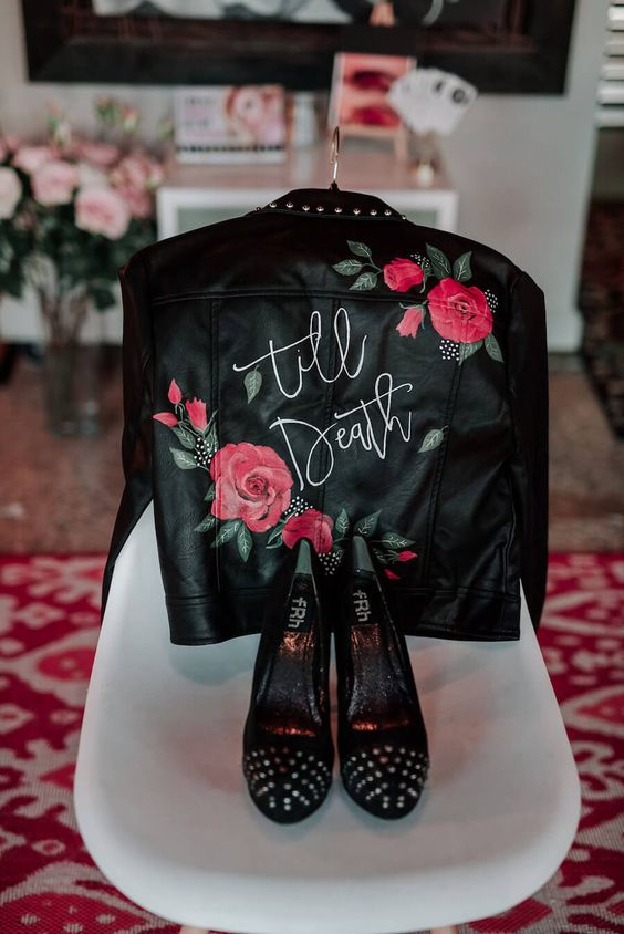 a beautiful black painted leather jacket with roses and studded shoes will add a bit of rock touch to your bridal look