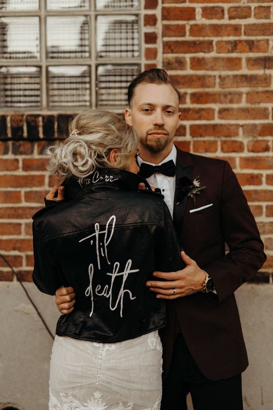 a black leather jacket with classic Till Death calligraphy is a great idea for a boho wedding, it looks bold and chic