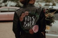 a black painted leather jacket with blooms is a beautiful and chic solution for covering up in the fall, it looks contrasting and chic