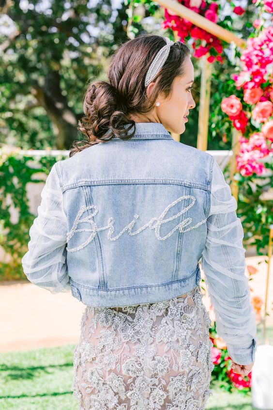 a bleached cropped denim bridal jacket with crystal embroidery and tulle sleeves is a very chic and cool idea