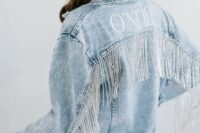 a blue denim bridal jacket with the new second name and long crystal fringe for a glam and boho feel at the same time