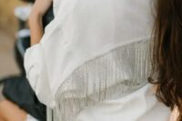 a white denim bridal jacket with crystal fringe is a very beautiful and glam wedding solution