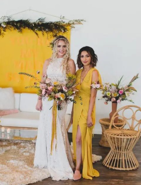 a yellow sleeveless wrap maxi bridesmaid dress and pink mules for a boho bridesmaid look