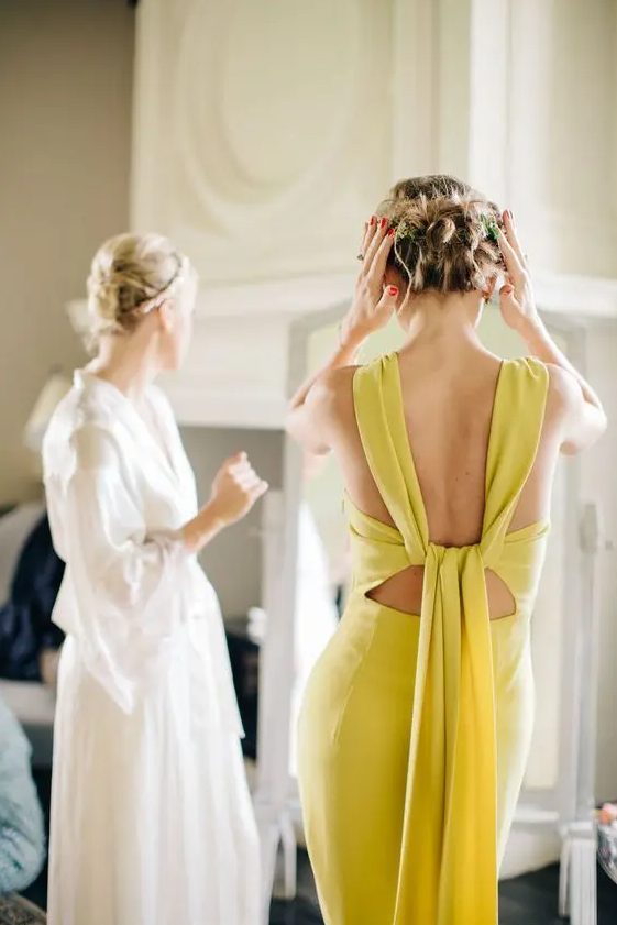 a zesty yellow bridesmaid dress with ties and a cutout back is a stylish and sexy idea to rock