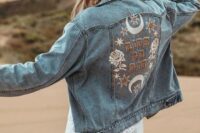 an embroidered and handpainted blue denim jacket and a camel hat will make your look more boho