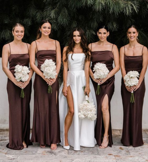 beautiful matching brown slip bridesmaid dresses with spaghetti straps adn thigh high slits