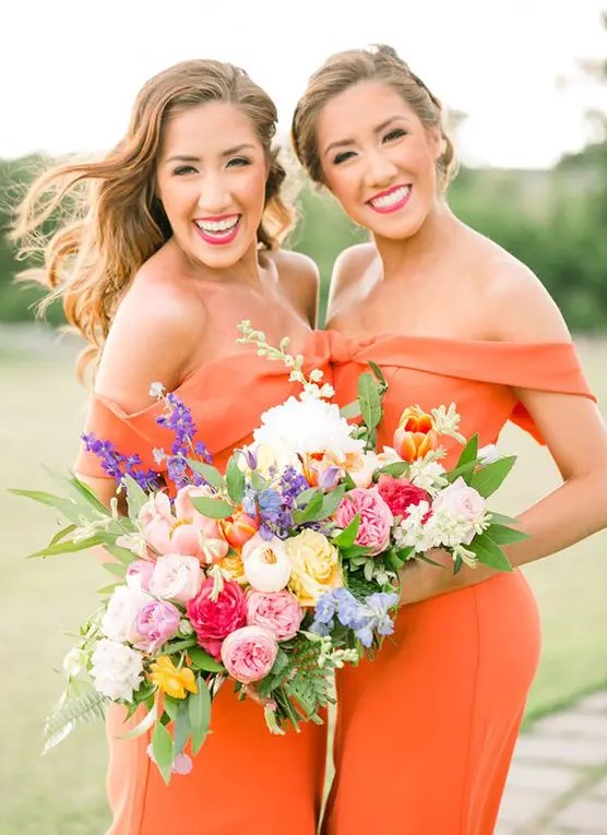 Bold orange off the shoulder semi fitting bridesmaid dresses and colorful bouquets for a bright summer wedding