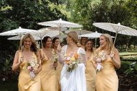 classy yellow satin maxi bridesmaid dresses with straps and V-necklines plus white shoes for a summer wedding