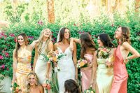 colorful bridesmaid dresses including blush, pink and yellow ones, with and without prints for a tropical wedding