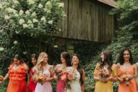 colorful bridesmaid maxi dresses – pink, blush, yellow, orange and red with mismatching designs are cool for a summer wedding