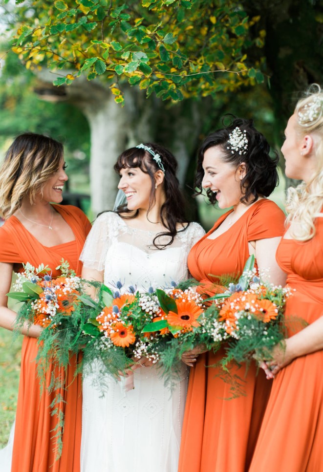 cool orange draped maxi bridesmaid dresses with short sleeves are amazing for a summer or fall wedding