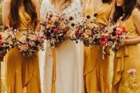 mismatched yellow high low ruffle bridesmaid dresses with thick straps and gold shoes for a bold fall wedding