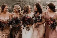 mismatching blush, mauve and taupe midi bridesmaid dresses for a boho fall wedding