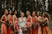 mismatching bridesmaid looks with pink, orange, rust and blush maxi and midi dresses are amazing for a boho wedding