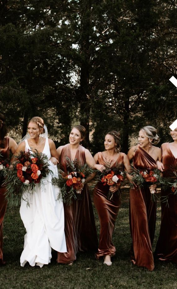 mismatching brown velvet maxi bridesmaid dresses are a great idea for a bold fall wedding