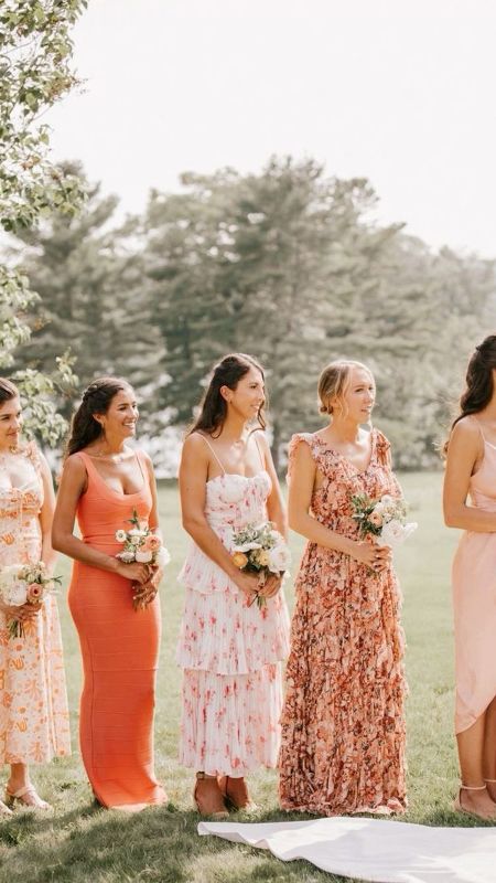 mismatching floral maxi and midi and a maxi plan orange bridesmaid dress for a bright and vivacious summer wedding