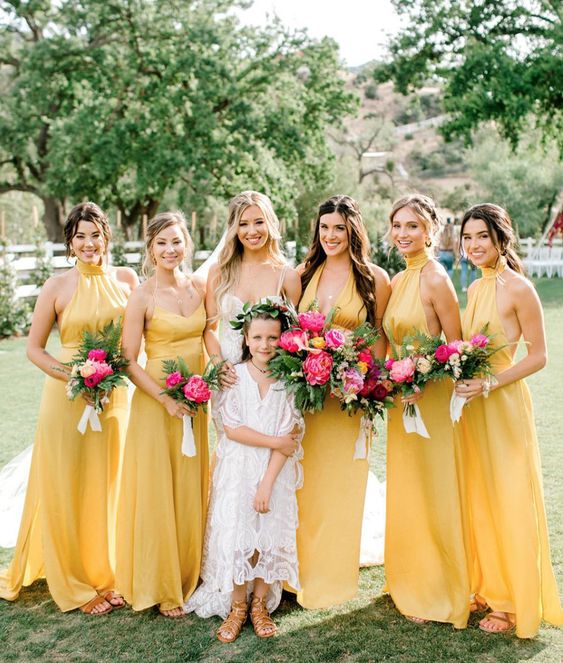 mismatching maxi yellow bridesmaid dresses are a great solution for a colorful summer wedding
