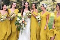 mismatching mustard yellow maxi bridesmaid dresses are a gorgeous idea for a summer or fall wedding