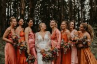 mismatching pink, orange and mustard satin maxi and midi bridesmaid dresses for a wedding with such a color scheme