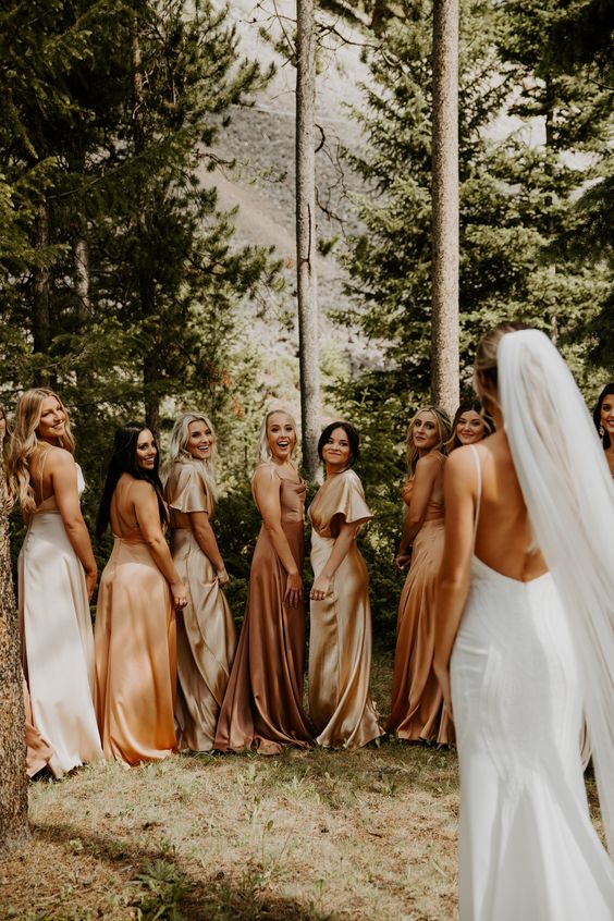 mismatching satin white, blush, brown and champagne maxi bridesmaid dresses for a summer wedding