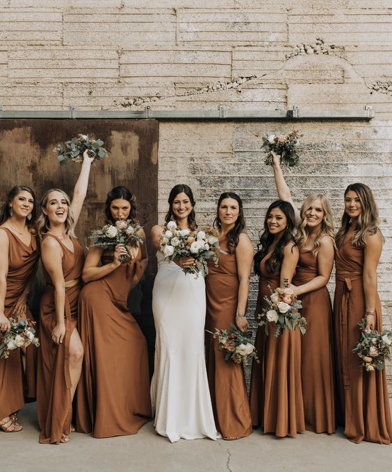 mismatching toffee brown maxi bridesmaid dresses will be a nice solution for a fall wedding