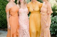 msiamtching blush, pink, orange and yellow midi bridesmaid dresses with various detailing and prints for a summer wedding