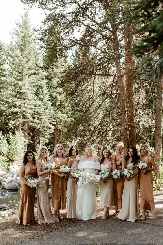 msiamtching creamy, beige and brown midi and maxi bridesmaid dresses for an all-neutral wedding