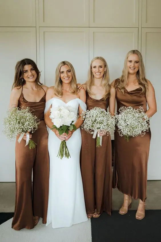 stylish brown cowl neck stained midi and maxi dresses plus a jumpsuit and nude shoes for a fall wedding