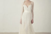 01 V-neckline dress with lace and buttons down the whole dress and a matching veil