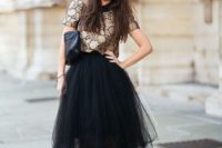 a glam winter bridal shower look with a printed metallic top, a black tutu skirt, a black bag and black heels