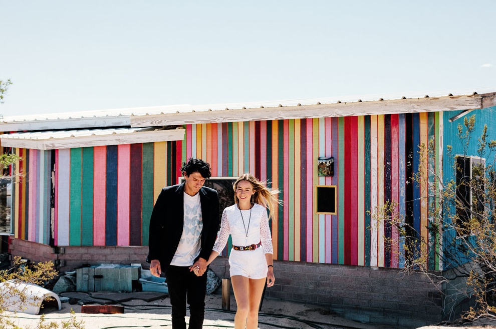 They got ready in a rainbow desert rental decorated in boho chic style
