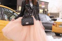 an edgy chic bridal shower outfit with a pink tutu skirt, a grey sweatshirt, a black leather jacket, black shoes is lovely