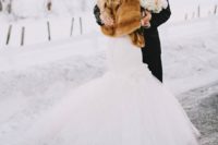 03 chic fur cover up adds glam to this bridal outfit